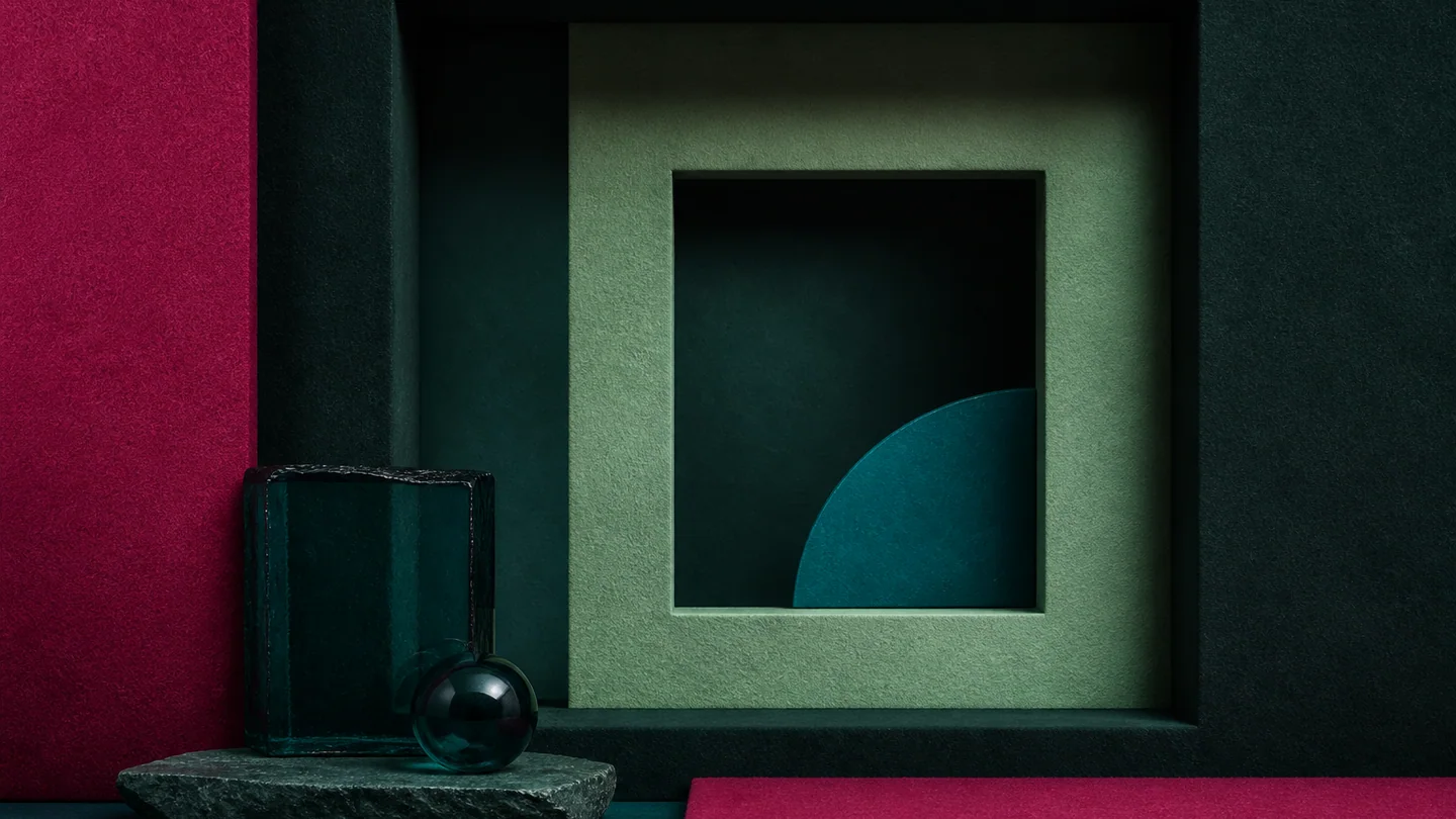 Nested square niches and dark glass in pomegranate purple, pale green, blue green, and deep slate green.